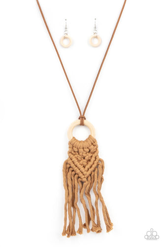 Crafty Couture - Paparazzi - Strands of brown yarn-like thread delicately weaves into a knotted macrame pattern at the bottom of a white wooden hoop. Dainty strands of brown suede knot around the pendant for an earthy flair.