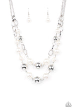 Load image into Gallery viewer, Sections of oversized silver chains, white pearls, and shiny silver beads haphazardly link into two timeless layers below the collar, creating a dramatically refined display. Features an adjustable clasp closure.
