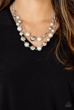 Load image into Gallery viewer, Sections of oversized silver chains, white pearls, and shiny silver beads haphazardly link into two timeless layers below the collar, creating a dramatically refined display. Features an adjustable clasp closure.

