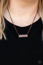 Load image into Gallery viewer, Paparazzi - Joy Of Motherhood - Copper - Stamped in a heart and the word, &quot;Mother,&quot; an antiqued copper plate is suspended by a classic copper chain below the collar, creating a whimsical sentimental pendant.
