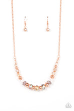 Load image into Gallery viewer, TURN UP THE TEA LIGHTS - BLUSH COPPER - Paparazzi - Varying in opacity, an enchanting collection of iridescent pink, white and champagne colored crystal-like beads are threaded along an invisible wire that is attached to a shiny blush copper chain below the collar. Mismatched blush copper beads and ornate blush copper accents are sprinkled between the glittery compilation, adding whimsy and sheen to the colorful statement piece.
