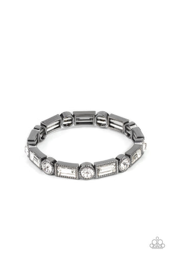 CLASSIC COUTURE - Paparazzi - Classic round and baguette-cut rhinestones set in shiny dotted gunmetal frames alternate around the wrist on stretchy bands for a shimmering finish.
