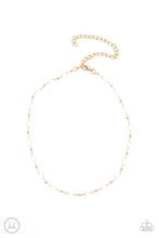 Load image into Gallery viewer, Urban Expo - Gold - Paparazzi - Dainty gold beads and cylindrical white beads delicately link around the neck, creating a minimalist inspired pop of color.
