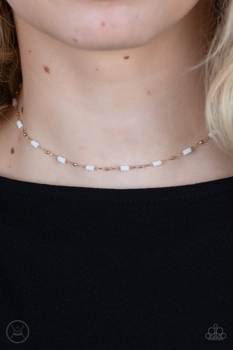 Urban Expo - Gold - Paparazzi - Dainty gold beads and cylindrical white beads delicately link around the neck, creating a minimalist inspired pop of color.