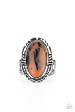 Load image into Gallery viewer, Peacefully Pioneer - Paparazzi - An earthy brown oval stone is pressed into the center of a textured silver frame, creating an abstract artisanal display atop the finger. Features a stretchy band for a flexible fit.
