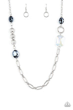 Load image into Gallery viewer, Famous and Fabulous - Blue - Paparazzi - A mismatched assortment of oval, round, textured, and silver hoops haphazardly link into a chaotic chain below the collar. Featuring oval and emerald style cuts, oversized metallic blue and iridescent gems sporadically adorn the chain for a glitzy finish.
