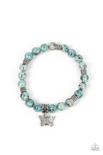 Load image into Gallery viewer, BUTTERFLY NIRVANA - BLUE - Infused with a silver butterfly charm, textured silver accents and black speckled blue stone beads are threaded along stretchy bands around the wrist for a whimsical look.
