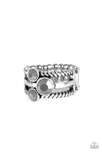 Paparazzi - Head In The Stars - Silver - A trio of glittery hematite rhinestones are sprinkled along smooth and twisted silver bands, creating edgy layers across the finger.