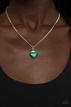 Load image into Gallery viewer, Gracefully Gemstone - Green - Paparazzi - A silver triangle frame tops a triangular cut green cat&#39;s eye stone pendant at the bottom of a dainty silver chain, resulting in a graceful gemstone pendant below the collar.
