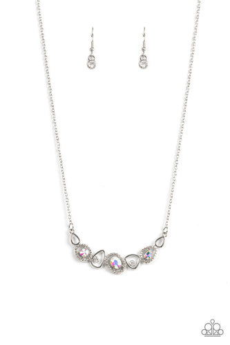 Celestial Cadence - Multi-Iridescent -Paparazzi - An incandescent assortment of shiny silver frames, dainty white rhinestones, and oversized iridescent gems delicately coalesce into a statement-making sparkle below the collar.