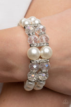 Load image into Gallery viewer, Paparazzi - Timelessly Tea Party - White - Held together by white rhinestone encrusted silver frames, a stretchy pair of bubbly pearl bracelets are infused with white rhinestone encrusted silver rings, iridescent crystal-like beads, and oversized white pearls for a timeless finish.
