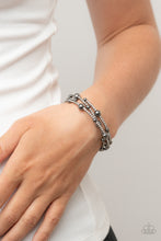 Load image into Gallery viewer, Paparazzi - Spontaneous Shimmer - Black - Spontaneously interrupted by glistening gunmetal beads, a sparkly strand of white rhinestones coils around the wrist, resulting in an irresistible infinity wrap bracelet. 
