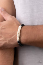 Load image into Gallery viewer, Paparazzi - Recreational Remedy - White - White wooden discs and smooth black stone beads are threaded along stretchy bands around the wrist, resulting in an earthy combo.
