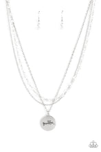 Load image into Gallery viewer, Promoted to Grandma - White - Paparazzi - Infused with a strand of iridescent crystal-like beads, two dainty rows of mismatched silver chains delicately layer below the collar. Stamped in the word, &quot;Grandma,&quot; a shiny silver disc swings from the lowest chain, creating a loving pendant.
