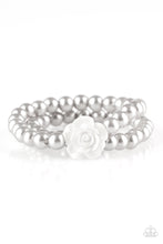 Load image into Gallery viewer, Connected by a flirty white resin rose, classic silver pearls are threaded along stretchy bands around the wrist for a vintage inspired fashion. $5 JEWELRY 
